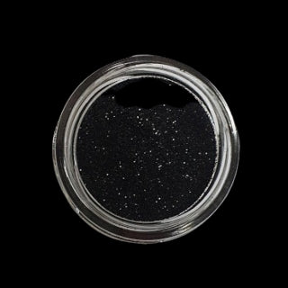 Ein Glas Glitter Schwarz (B1000, 50 ml) von FLEURY auf schwarzem Hintergrund.
