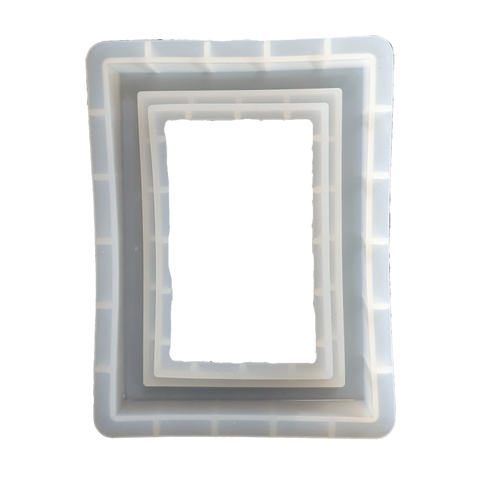 Ein Silikonform für Resin Art (AM698) Bilderrahmen von FLEURY aus weißem Kunststoff.